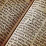 读者苏合的头像，背景是旧书页与一支钢笔